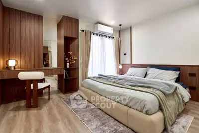 Luxurious modern bedroom with elegant wood paneling and cozy lighting