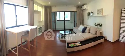 Spacious modern living room with elegant decor and natural light