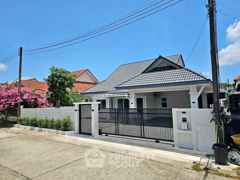 Charming suburban house with modern design and spacious driveway, perfect for family living.