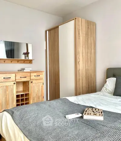 Cozy bedroom with modern wooden furniture and stylish decor