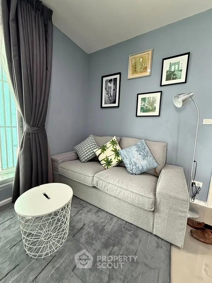 Cozy living room with stylish decor and natural light