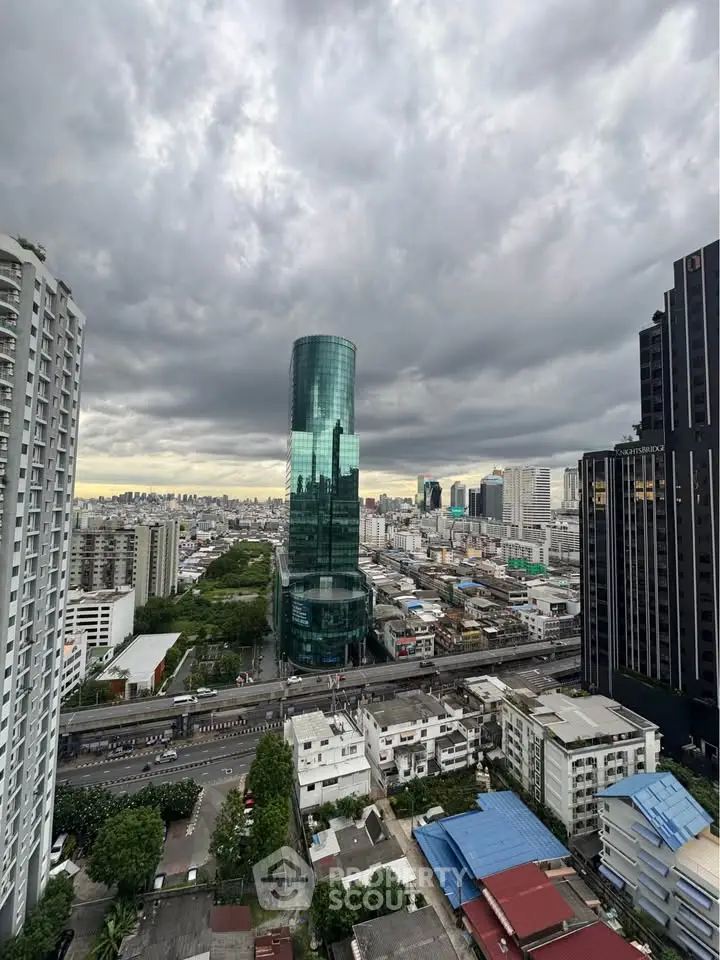Stunning cityscape view with modern skyscraper and cloudy sky