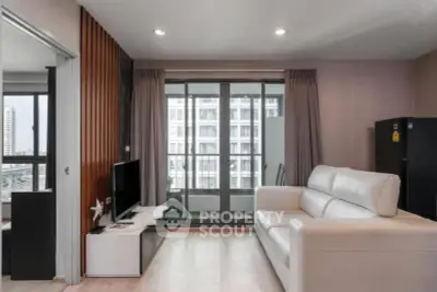 Modern living room with white sofa and balcony view in urban apartment