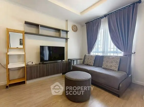 Modern living room with stylish furniture and natural light