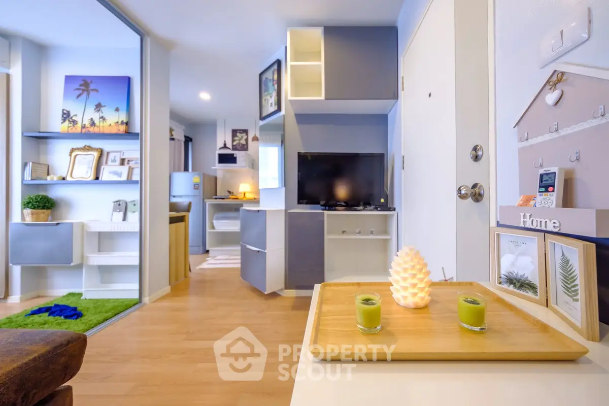 Modern living room with stylish decor and open layout, featuring a cozy ambiance and contemporary furnishings.