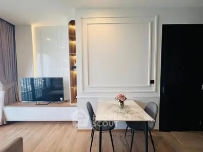 Modern living room with stylish dining area and elegant decor