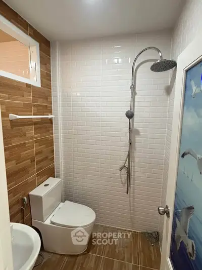 Modern bathroom with sleek shower and stylish tile design
