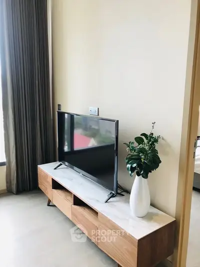 Modern living room with sleek TV stand and elegant decor