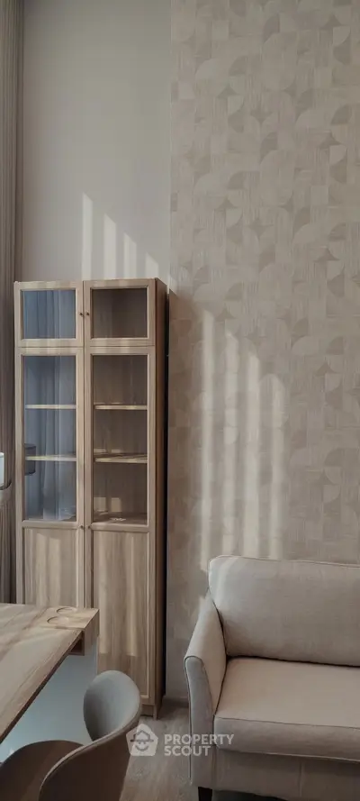 Modern living room with stylish wooden cabinet and cozy sofa