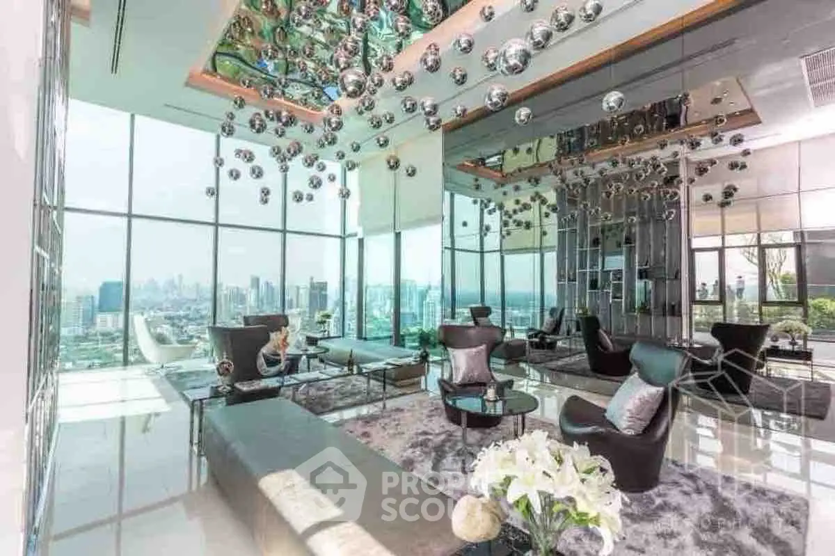 Luxurious modern living room with panoramic city view and unique ceiling decor.