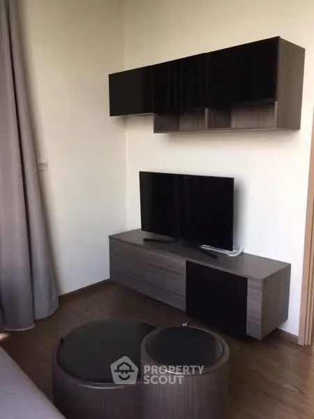 Modern living room with sleek TV unit and stylish decor