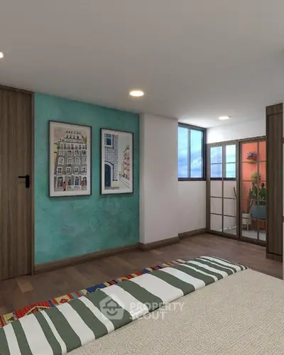 Stylish bedroom with balcony access and modern decor in urban apartment