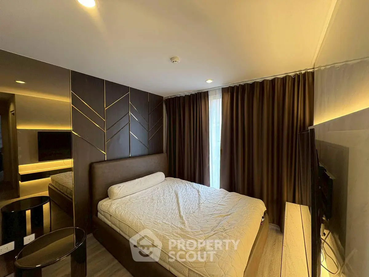 Luxurious modern bedroom with stylish decor and ambient lighting