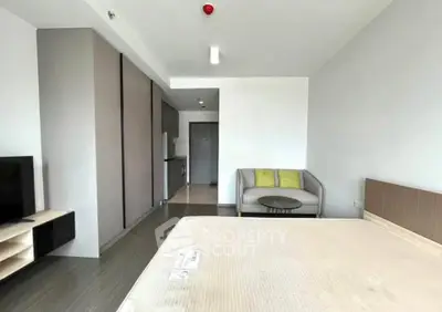 Modern studio apartment with minimalist design and natural light