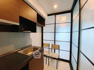 Modern kitchen with sleek design and ample storage space
