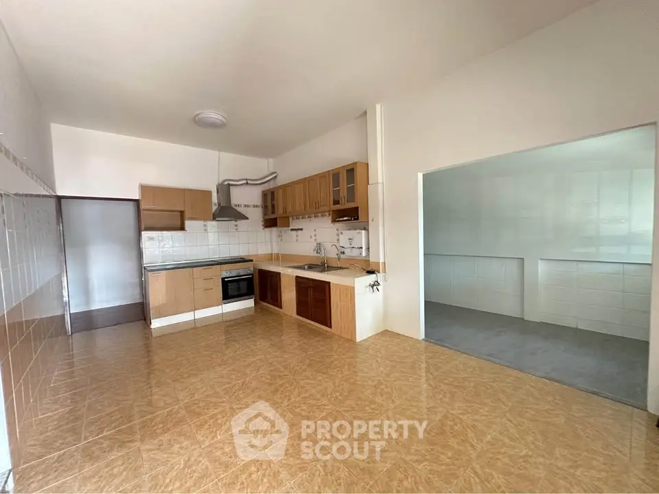 Spacious kitchen with open layout and modern cabinetry