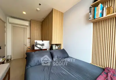 Modern bedroom with sleek design, built-in storage, and cozy ambiance.