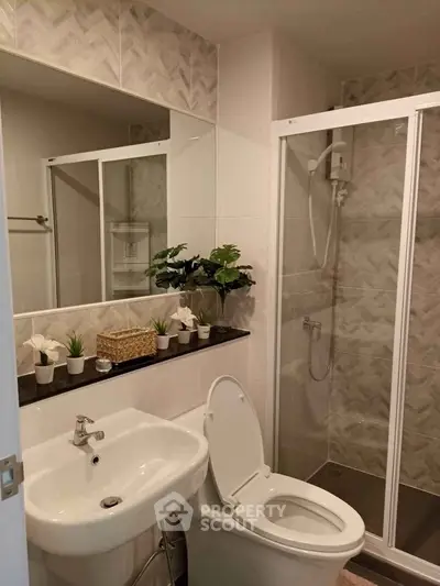 Modern bathroom with glass shower and stylish decor