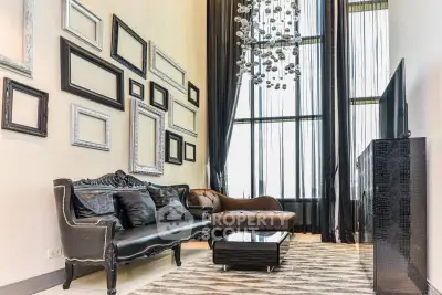 Luxurious living room with high ceilings and elegant decor