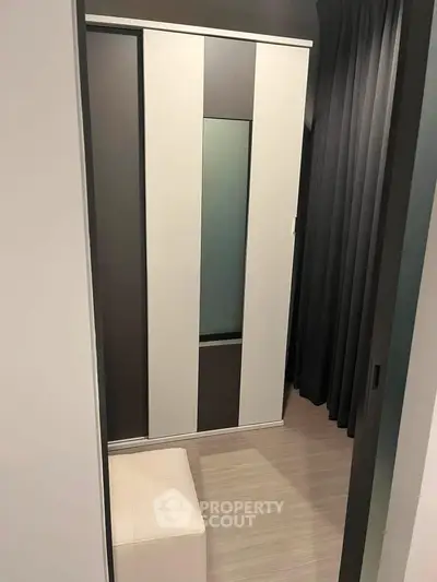 Modern storage room with sleek wardrobe and minimalist design