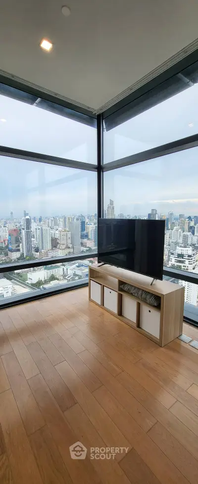 Stunning high-rise apartment with panoramic city views and modern interior design.