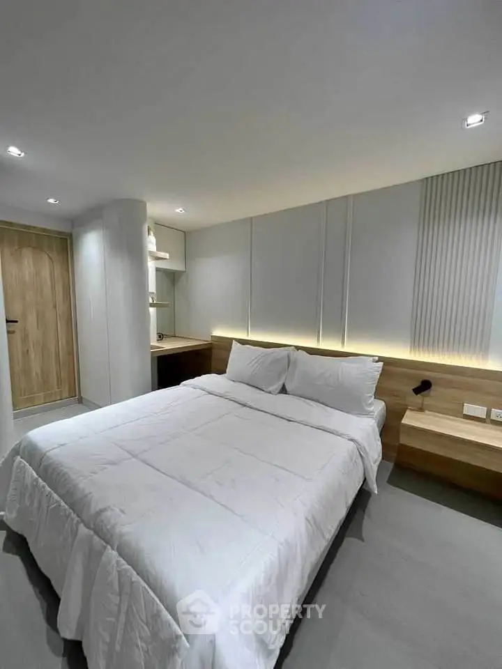 Modern bedroom with cozy lighting and minimalist design