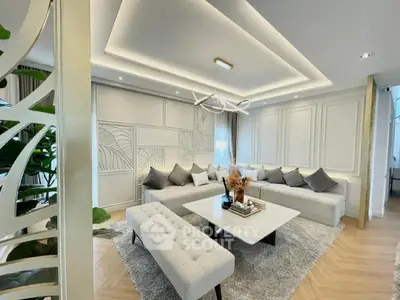 Luxurious modern living room with elegant decor and spacious seating area