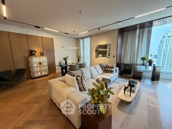 Luxurious modern living room with elegant decor and stunning city view.