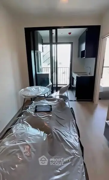 Modern apartment with open layout and balcony access
