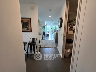 Spacious modern living room with stylish decor and open layout, perfect for entertaining.