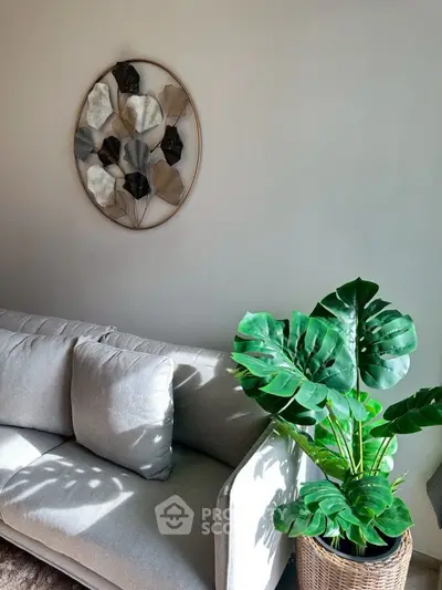 Stylish living room with modern decor and lush indoor plant