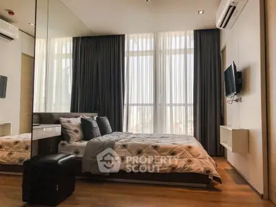 Luxurious modern bedroom with floor-to-ceiling windows and elegant decor