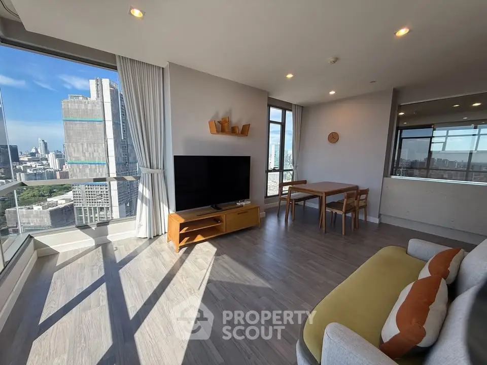 Spacious modern living room with stunning city view and stylish furnishings