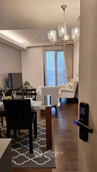 Elegant living room with modern decor and digital lock entry