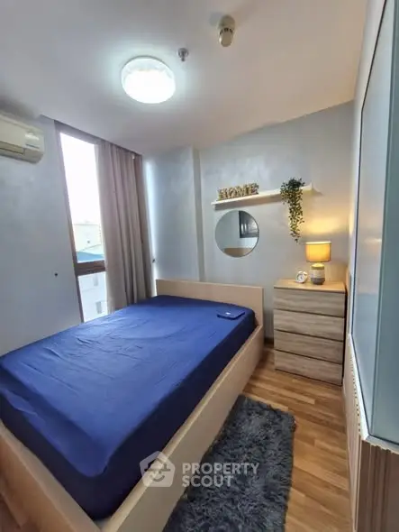 Cozy bedroom with modern decor and natural light