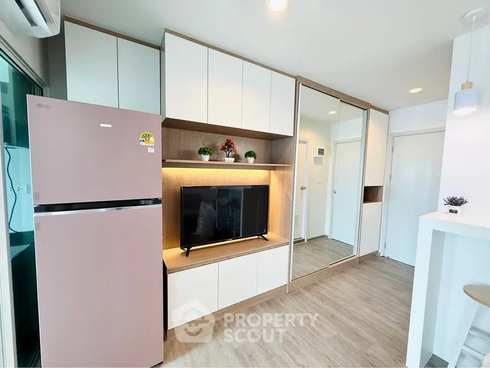 Modern living room with sleek cabinetry and stylish decor