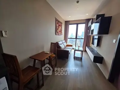 Modern living room with city view, featuring stylish furniture and wall-mounted shelves.