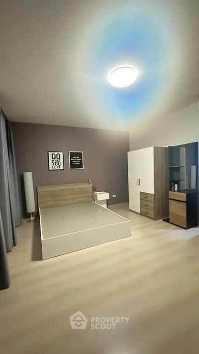 Modern minimalist bedroom with sleek furniture and stylish decor