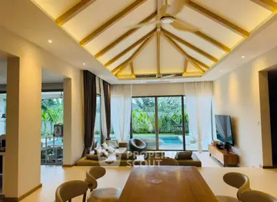 Luxurious living room with high ceiling and pool view, featuring modern furniture and elegant lighting.