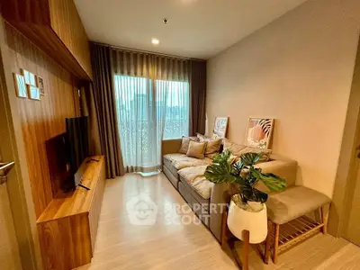 Stylish living room with cozy sofa and modern decor, featuring a large window with city view.