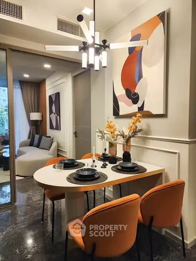 Stylish modern dining area with elegant decor and cozy living room view