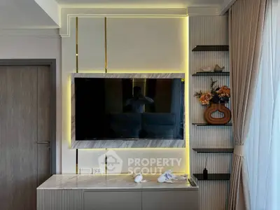 Modern living room with stylish TV setup and elegant decor