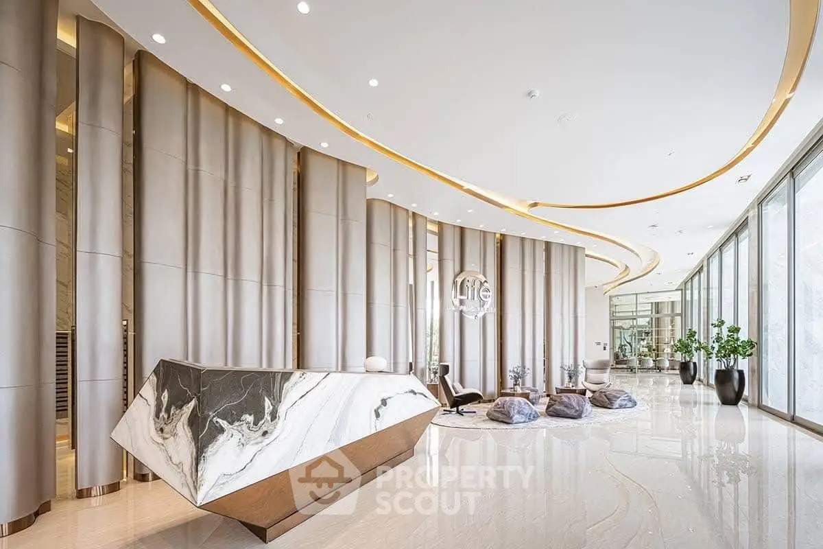 Luxurious modern lobby with sleek marble reception desk and elegant lighting