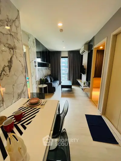 Modern living room with stylish decor and open layout in urban apartment