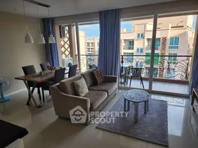 Spacious living room with elegant decor and balcony view in modern apartment