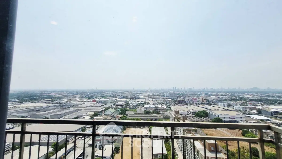 Stunning panoramic city view from high-rise balcony, perfect for urban living enthusiasts.