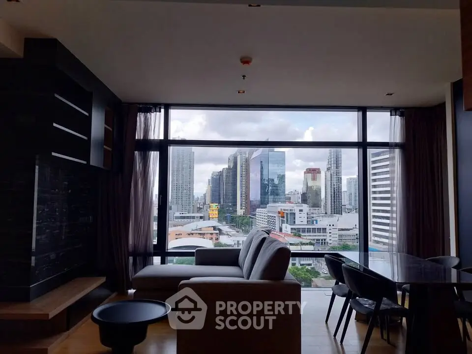 Modern living room with panoramic city view and stylish furniture