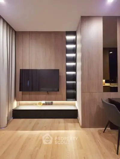 Modern living room with sleek wooden paneling and mounted TV