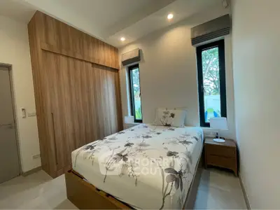 Cozy bedroom with modern design and natural light