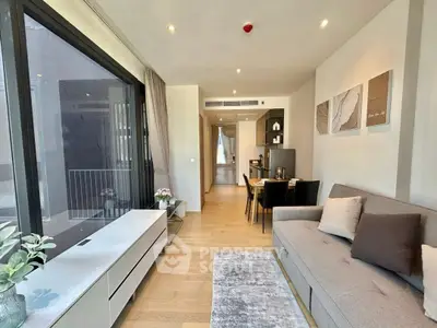 Modern living room with stylish decor and open layout in a contemporary apartment.